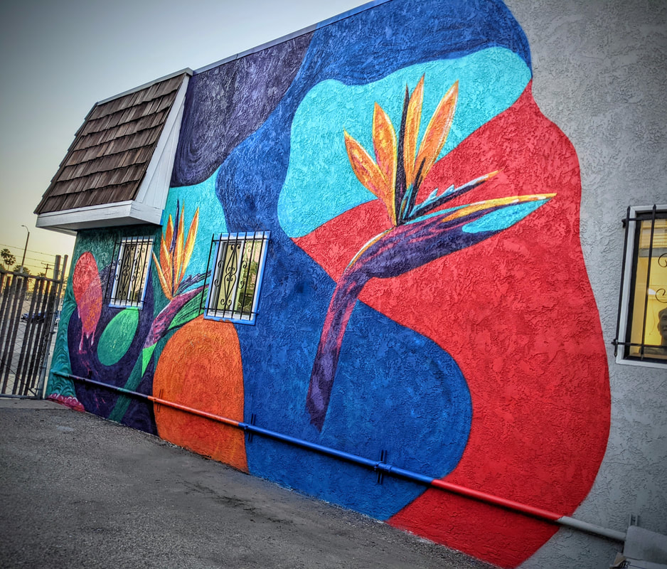 Bird of paradise mural — building-scale street art